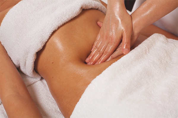 Massage giảm mỡ bụng